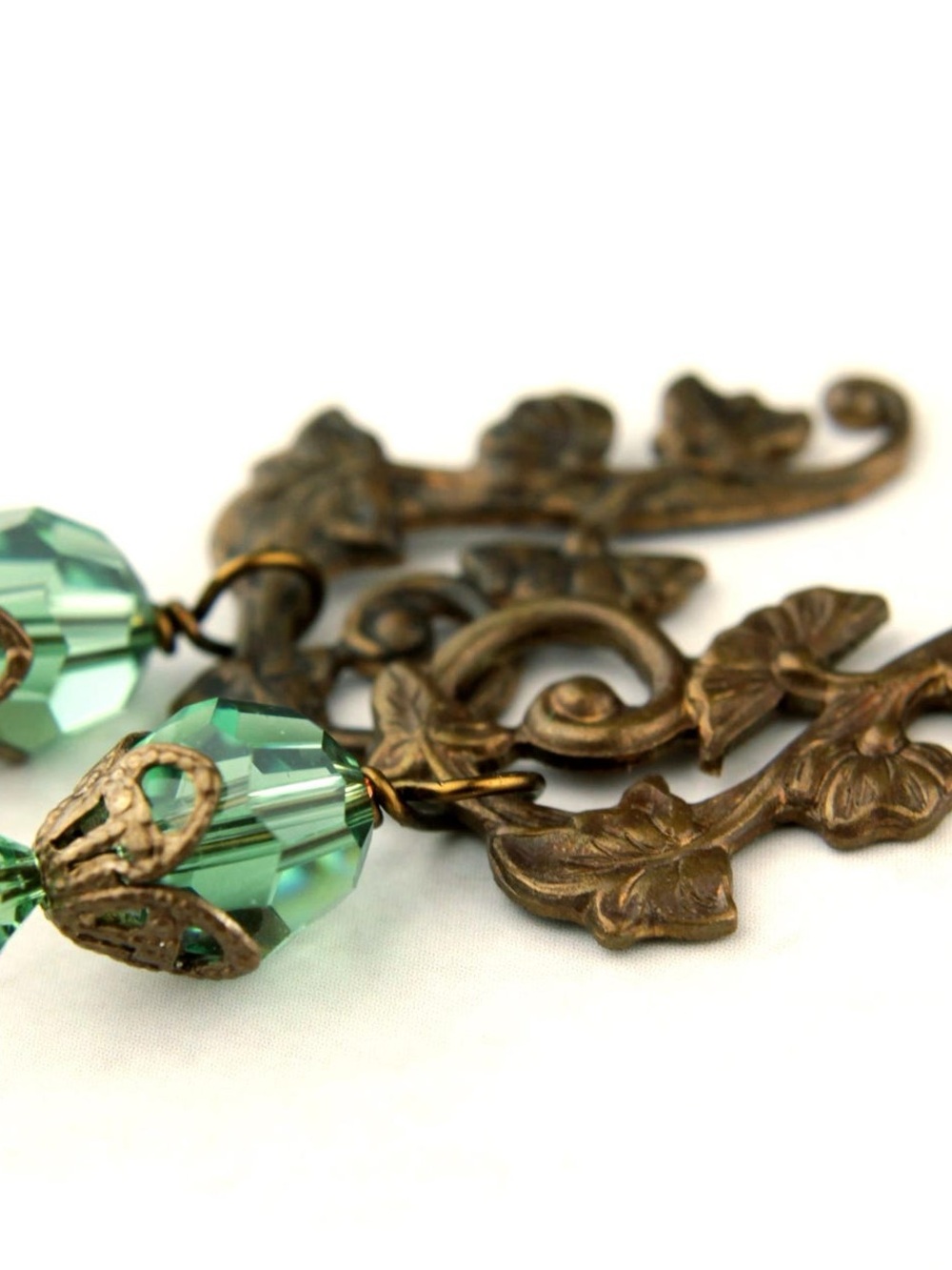 Vintage-Inspired Brass Floral Earrings with Green Crystal Beads